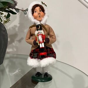 Byers Choice girl with nutcracker.